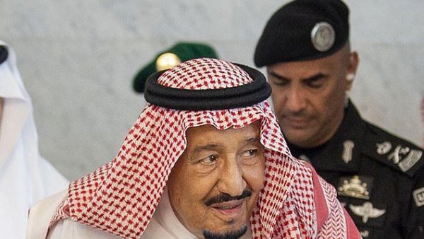 General Abdelaziz al-Fagham (back) recently accompanied King Salman (front) to receive the Iraqi Prime Minister in Jeddah (AFP)