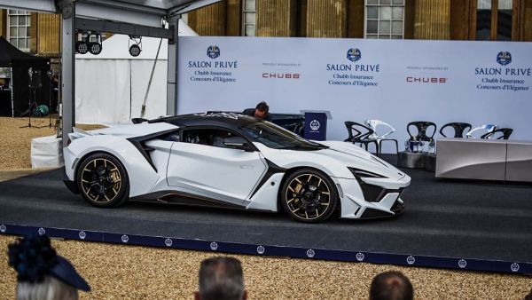 The Fenyr SuperSport was presented in Arctic white with gold accents and drew crowds with its dynamic lines The Fenyr SuperSport was presented in Arctic white with gold accents and drew crowds with its dynamic lines