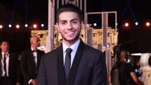 Mena appeared sitting amid the band playing and singing Source menamassoud Instagram