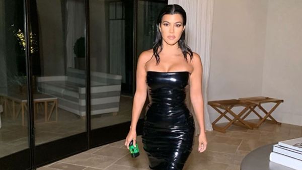 she posed for sister Kim's new shapewear line on Saturday.   