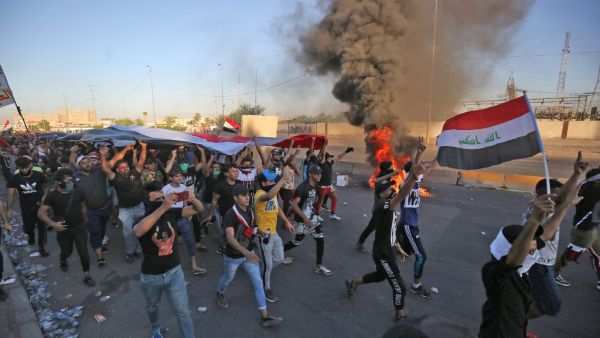 Iraqi security forces said "unidentified snipers" killed four people across the capital Baghdad today, the fourth day of violent anti-government protests. AHMAD AL-RUBAYE / AFP