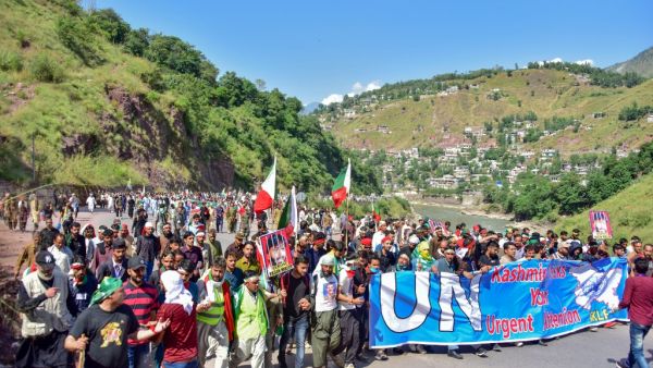 Kashmiri people march towards the border town of Chokathi to protest against the Indian government lockdown of Indian-controlled Kashmir, in Muzaffarabad on October 5, 2019. (AFP/ File Photo) Kashmiri people march towards the border town of Chokathi to protest against the Indian government lockdown of Indian-controlled Kashmir, in Muzaffarabad on October 5, 2019. (AFP/ File Photo)