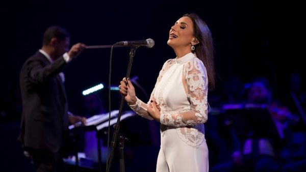 One of the fans was able to go up the stage while Angham was singing Source angham Instagram