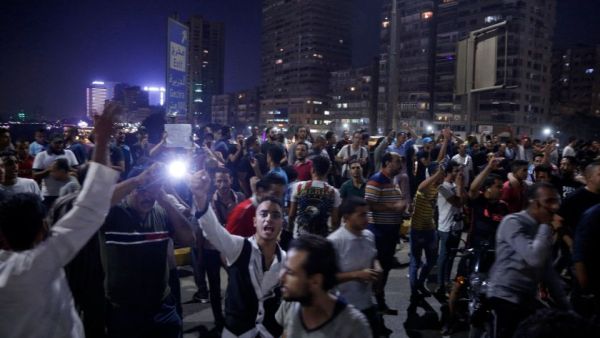 Egyptian protesters shout slogans as they take part in a protest in Cairo’s downtown on Friday calling for the removal of President Abdel Fattah Sisi. (AFP) Egyptian protesters shout slogans as they take part in a protest in Cairo’s downtown on Friday calling for the removal of President Abdel Fattah Sisi. (AFP)
