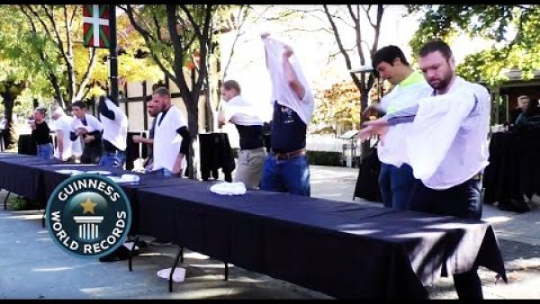 Employees at an Idaho company broke a Guinness world record when 10 people managed to pass 10 T-shirts down a line in just under 2 minutes. (YouTube)