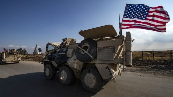 A convoy of US troops is pictured outside the Kurdish-majority city of Qamishli, in Syria's northeastern Hasakeh province on November 2, 2019. Delil SOULEIMAN / AFP