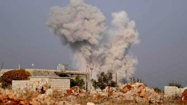 Smoke billows following airstrikes by pro-government forces on the village of Kafr Nabl, in Syria's southern Idlib province on November 13, 2019. (Omar HAJ KADOUR / AFP)