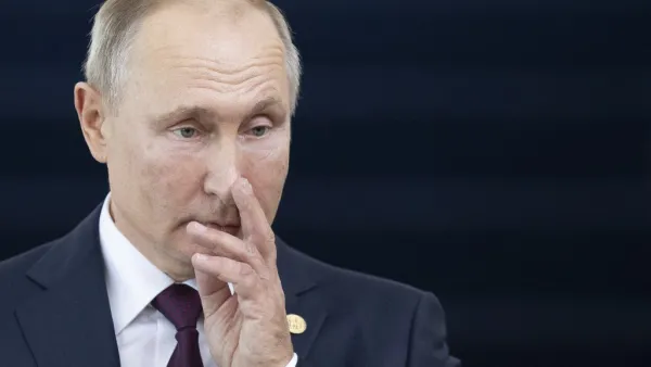 Russia's President Vladimir Putin gestures before the 11th BRICS Summit at the Itamaraty palace on November 14, 2019 in Brasilia, Brazil. Brazil's President Jair Bolsonaro walked a diplomatic tightrope, as he seeks to boost ties with Beijing and avoid upsetting key ally Donald Trump, on the eve of a summit with their BRICS counterparts from Russia, India and South Africa. Pavel Golovkin / POOL / AFP