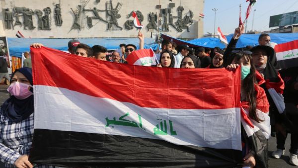 Iraqi demonstrators gather in the capital Baghdad's Tahrir square during ongoing anti-government demonstrations  (AFP)