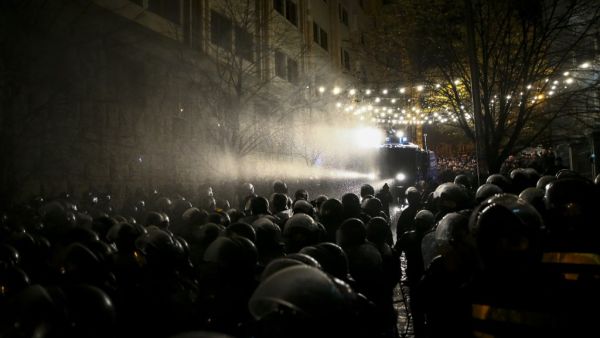 Riot police use a water cannon against protesters demanding the government's resignation and early parliamentary polls outside the parliament in Tbilisi on November 26, 2019. Zurab Tsertsvadze / AFP