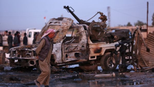 A picture taken on November 26, 2019 shows destroyed vehicles following a car bomb attack at a local market in the Turkish-held Syrian Kurdish town of Tel Hal along the border with Turkey in the northeastern Hassakeh province. (Nazeer Al-khatib / AFP)