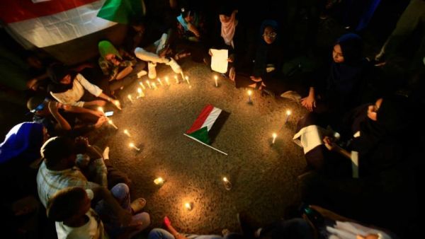 More than 120 protesters were killed in the massacre [AFP]