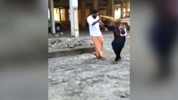 A man sprayed chilli and pepper on the face of Bindu Ammini, who was on her way to Sabarimala temple on Tuesday. (Video Screenshot)