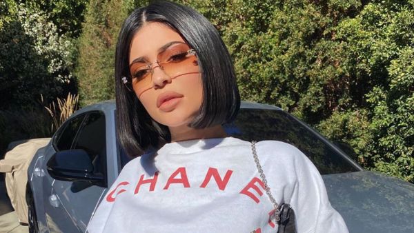 Kylie's ensemble featured a warm turtle-neck and long sleeves for the family celebration. 