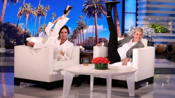 Victoria Beckham showed off her signature pose in a very chic suit (Twitter)