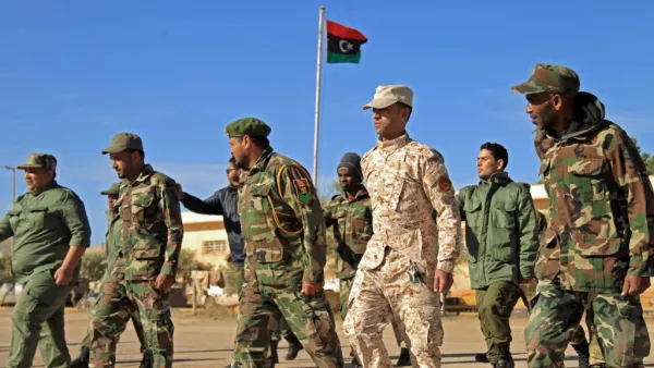 Fighters of a military battalion loyal to Libyan General Khalifa Haftar march during the morning assembly in the eastern city of Benghazi on December 18, 2019. Abdullah DOMA / AFP