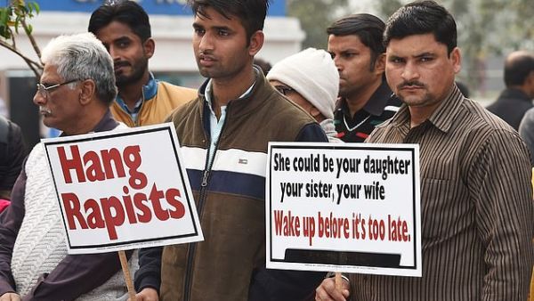 Demonstrators hold placards to protest against the alleged rape and murder of another woman, a 27-year-old veterinary doctor in Hyderabad, Saturday December 7. (AFP/ File Photo)