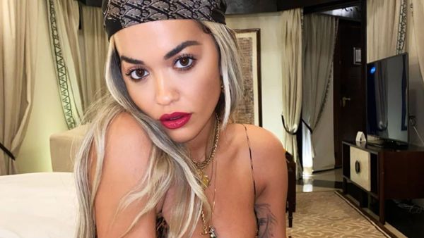 The one-sleeve dress was teamed with a pair of equally unusual shoes,