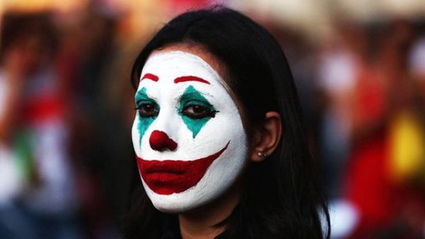 Protestors in Chile, Beirut and Hong Kong have adopted the Joker's clown mask to represent their anti-establishment views  (Twitter)