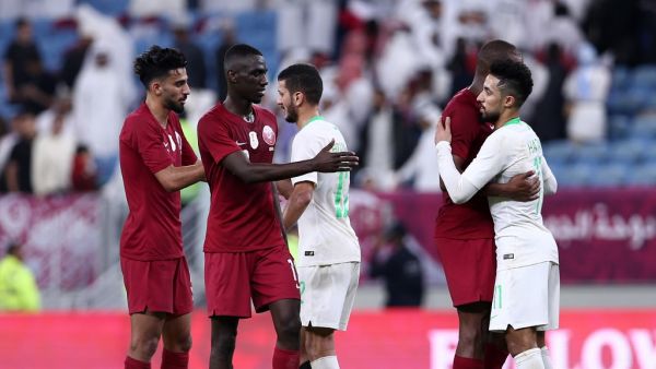 Qatar's players shake hands and embrace with Saudi's after the 24th Arabian Gulf Cup semi-final football match between Saudi Arabia and Qatar at al-Janoub Stadium in the Qatari capital Doha on December 5, 2019. MUSTAFA ABUMUNES / AFP