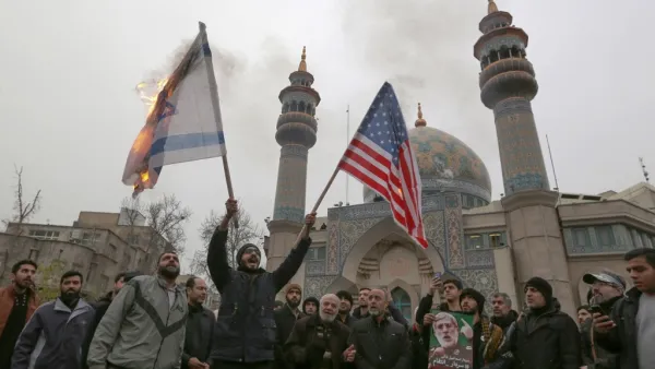Iranians burn an Israeli and a US flag during an anti-US protest over the killings during a US air stike of Iranian military commander Qasem Soleimani and Iraqi paramilitary chief Abu Mahdi al-Muhandis, in the capital Tehran on January 4, 2020. ATTA KENARE / AFP