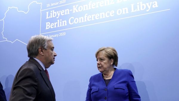 Secretary-General of the United Nations (UN) Antonio Guterres and German Chancellor Angela Merkel leave after a press conference at the end of a Peace summit on Libya at the Chancellery in Berlin on January 19, 2020.  (AFP/ File Photo)