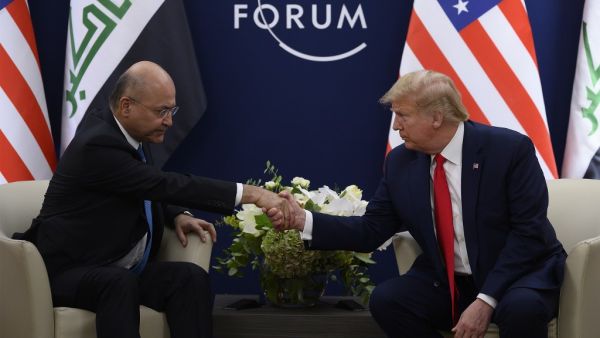 US President Donald Trump speaks with Iraqi President Barham Salih during a bilateral meeting at the World Economic Forum in Davos, Switzerland, on January 22, 2020. JIM WATSON / AFP