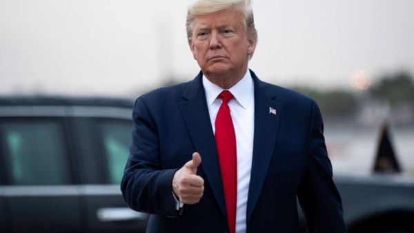 US President Donald Trump disembarks from Air Force One upon arrival at Miami International Airport in Miami, Florida, January 23, 2020, as he travels to speak at the Republican National Committee Winter Meeting. SAUL LOEB / AFP
