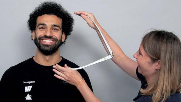 Egypt's Mohamed Salah in London taking several measurements for his wax sculpture. Madame Tussauds