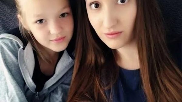 Maria Russkikh, 29, (pictured with her daughter) survived the fall and was found lying in the snow outside her flat in Novosibirsk, Siberia, moaning. (Daily MAil)