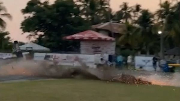 The plane races towards the person recording the footage before levelling out at the last minute, but then hits the grass and skids along the earth, before going out of shot. (Video Screenshot)