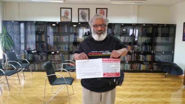 BV Narayana shows his brochure in English and Turkish explaining his causes for his second world tour in India's Istanbul consulate on December 31, 2019. (Credit: Murat Sofuoglu / TRTWorld)