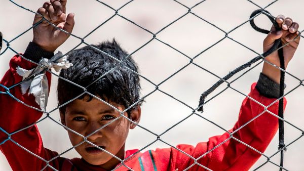 A Syrian child looks on in the Al-Hol camp in Syria, on 8 August 2019 pDELIL SOULEIMAN/AFP/Getty Images]