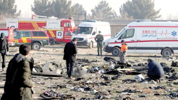 Rescue teams go through the debris after a Ukrainian plane carrying 176 passengers crashed in Tehran yesterday, killing all on board. Photo/AFP