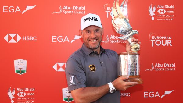 Westwood celebrates with the Falcon trophy