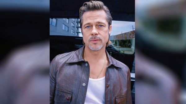 Brad admits he finds fame both "liberating and suffocating"