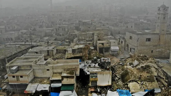 An aerial view taken on February 5, 2020, shows the aftermath of an air strike by pro-regime forces on the rebel-held town of Ariha in the northern countryside of Syria's Idlib province. Syrian regime forces pressed on with their offensive in the northwest that has displaced half a million people, despite heightened tensions with Turkey. Intensive aerial bombardment and ground fighting in the jihadist-dominated Idlib region since December have killed almost 300 civilians and triggered one of the largest wav