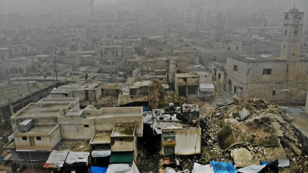 An aerial view taken on February 5, 2020, shows the aftermath of an air strike by pro-regime forces on the rebel-held town of Ariha in the northern countryside of Syria's Idlib province. Syrian regime forces pressed on with their offensive in the northwest that has displaced half a million people, despite heightened tensions with Turkey. Intensive aerial bombardment and ground fighting in the jihadist-dominated Idlib region since December have killed almost 300 civilians and triggered one of the largest wav