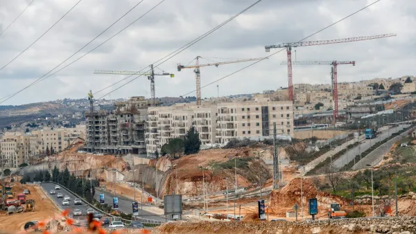 A picture taken on February 11, 2020 shows a view of ongoing construction work at Ramat Shlomo, a Jewish settlement in the Israeli-annexed eastern sector of Jerusalem. AHMAD GHARABLI / AFP