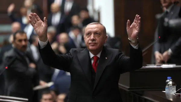 President of Turkey and leader of Justice and Development (AK) Party Recep Tayyip Erdogan waves as he attends the party's group meeting at Grand National Assembly of Turkey in Ankara, on February 12, 2020. Adem ALTAN / AFP