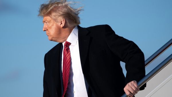 US President Donald Trump boards Air Force One prior to departure from Joint Base Andrews in Maryland, February 14, 2020, as he travels to Mar-a-lago in Florida for the weekend. SAUL LOEB / AFP