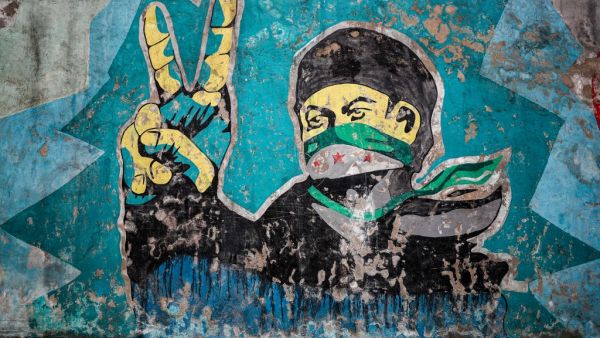 A picture taken on February 15, 2020, shows a mural inspired by the 2011 Syrian uprising in the deserted city of Kafranbel, south of Idlib city in the eponymous northwestern Syrian province, amid an ongoing pro-regime offensive. Omar HAJ KADOUR / AFP