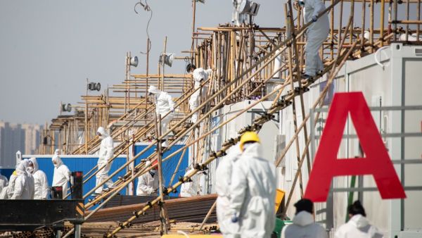 The first group of patients infected with the COVID-19 coronavirus was discharged from Leishenshan Hospital on February 18, according to local media. STR / AFP