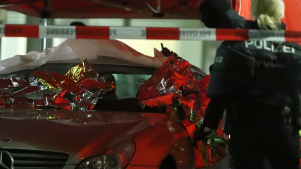 Emergency services and police work at the scene of a shooting in Hanau, western Germany, on February 20, 2020. At least eight people were killed in two shootings late on February 19 near the German city of Frankfurt, with an unknown number of attackers still at large, police said. The shootings targeted shisha bars in Hanau, about 20 kilometres (12 miles) from Frankfurt, according to local media, and police launched a huge manhunt in the town of around 90,000 people. Yann Schreiber / AFP