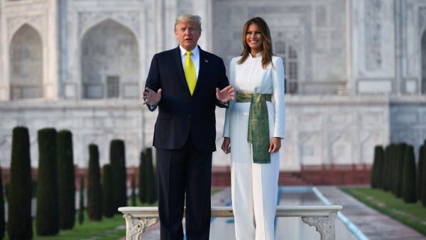 US President Donald Trump and First Lady Melania Trump pose as they visit the Taj Mahal in Agra on February 24, 2020. Mandel NGAN / AFP