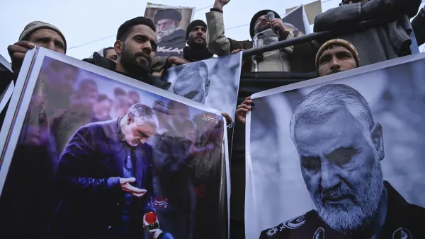 Protesters in Indian Kashmir shout slogans against the United States and Israel as they hold posters with the image of top Iranian commander Qasem Soleimani, who was killed in a U.S. airstrike in Iraq, Jan. 3, 2020. (Tauseef Mustafa/AFP via Getty Images)