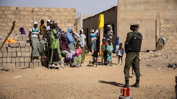 A Burkina Faso soldier patrols at a district that welcomes Internally Displaced People (IDP) from northern Burkina Faso, in Dori on February 3, 2020. (AFP)