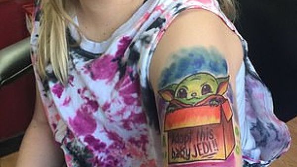 A tattoo parlour that does designs for children using multi-coloured permanent markers has divided parents with some hailing it an 'awesome idea' while others claim it’s a 'gateway drug to the real thing' (Dailymail)