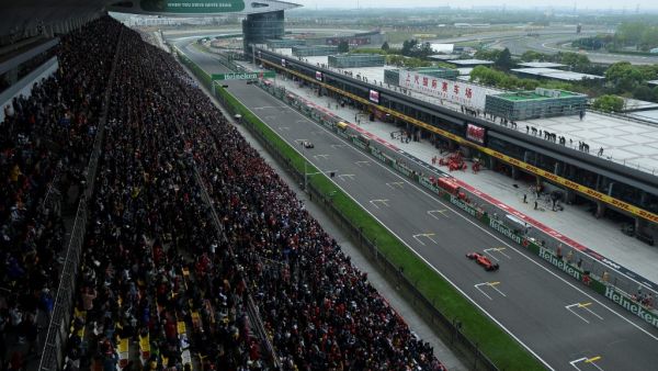 This general view shows spectators watching the Formula One Chinese Grand Prix in Shanghai on April 14, 2019. WANG ZHAO / AFP