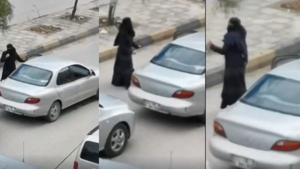 منقبة ترقص في الشارع العام